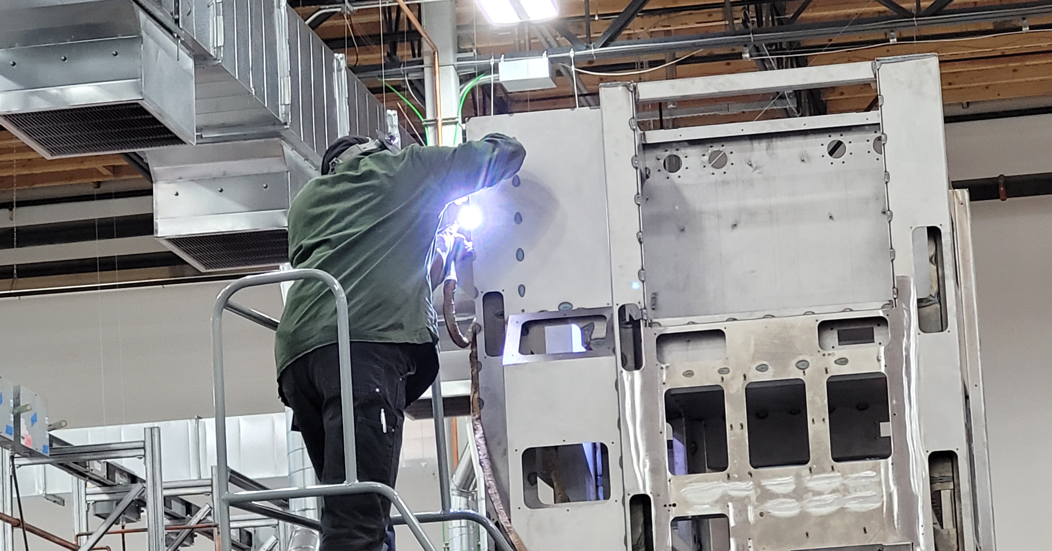 A photo of me welding a nitrogen purging system.